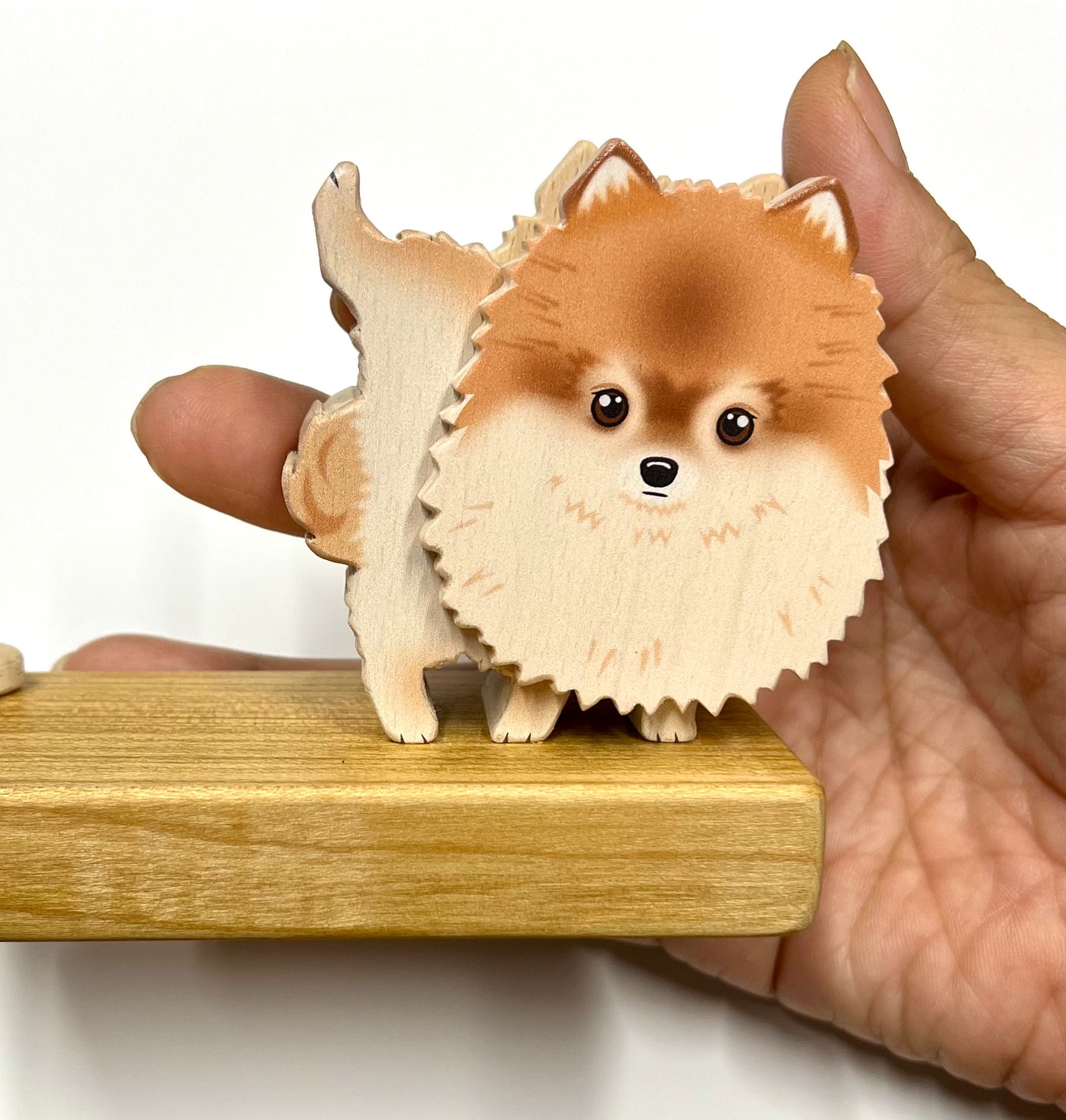 ポメラニアンのスマホスタンド【君は放物線を見たか?】